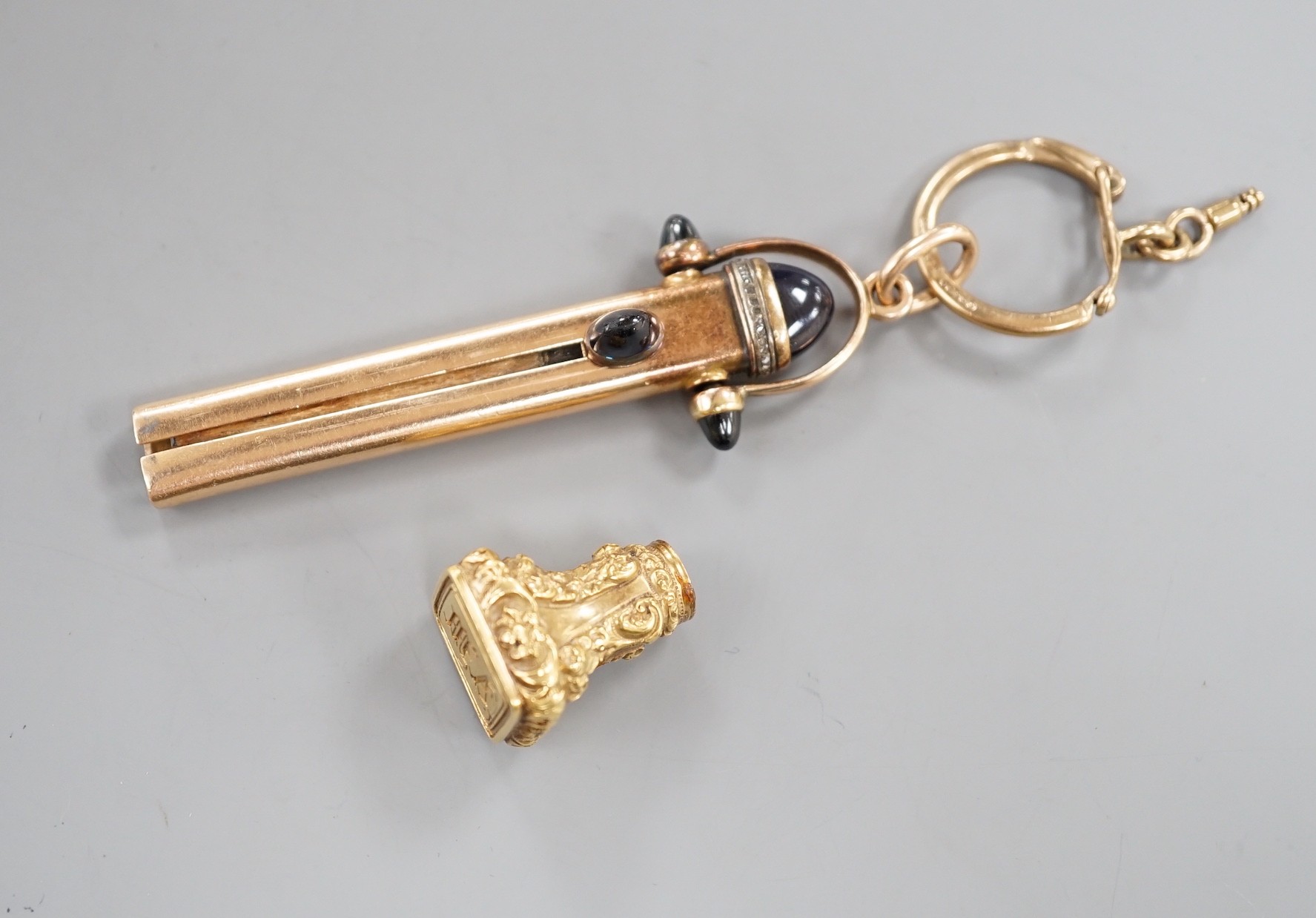 An early 20th century Russian 56 zolotnik yellow metal, four stone blue cabochon and rose cut diamond set propelling pencil holder, maker's mark, HW? overall 79mm, gross 18.7 grams, hung from a 9ct gold key ring, 3.8 gra